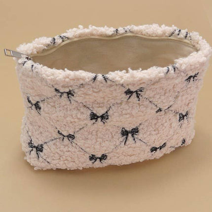 BOW SOFT LAMB WOOL COSMETIC POUCH BAG | 40P539