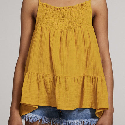 Smocked yoke tank