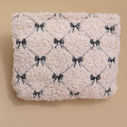 BOW SOFT LAMB WOOL COSMETIC POUCH BAG | 40P539