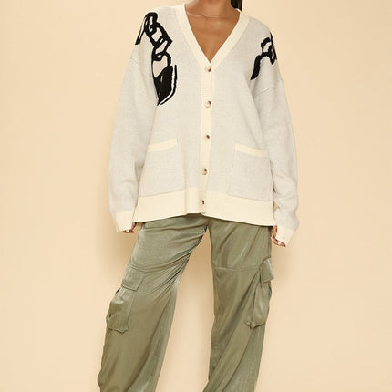 Lock and key chain cardigan