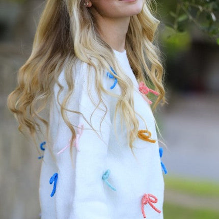 All over Bow knit sweater