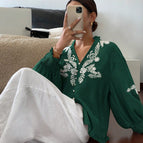 S / blackish green