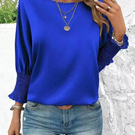Smocked cuffs  Long sleeve blouse
