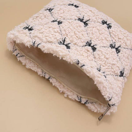 BOW SOFT LAMB WOOL COSMETIC POUCH BAG | 40P539