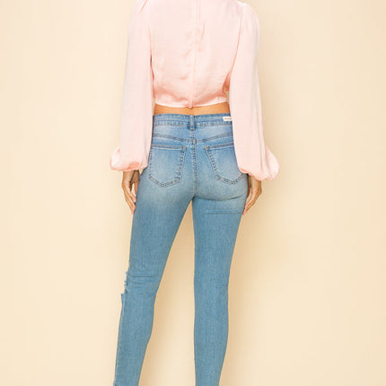 Long sleeve crop top with an open front design