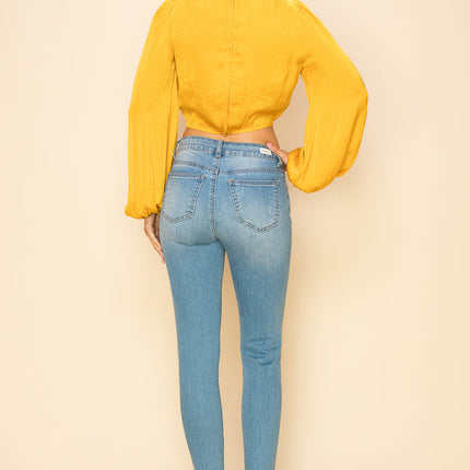 Long sleeve crop top with an open front design