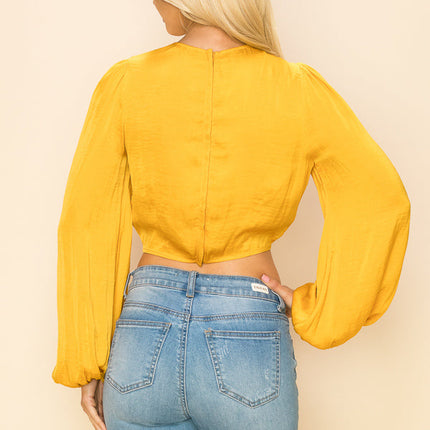 Long sleeve crop top with an open front design