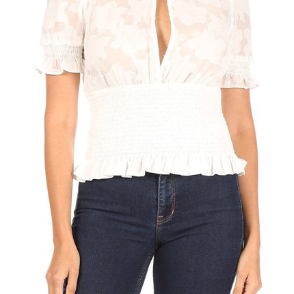 Floral short sleeve top with keyhole slit