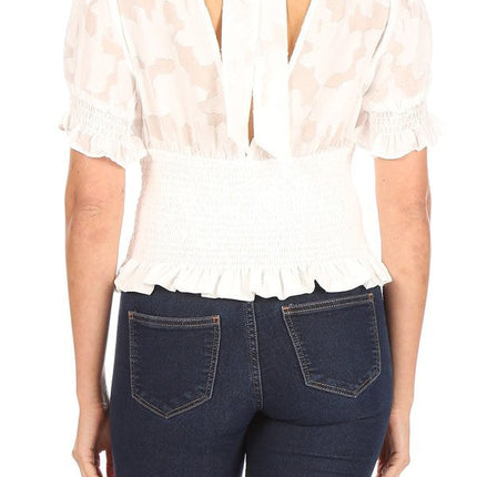 Floral short sleeve top with keyhole slit