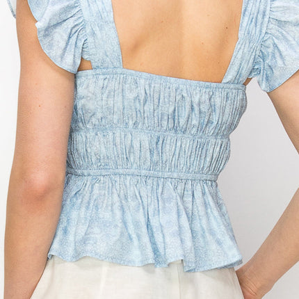Flounced cap sleeves and hem floral print top